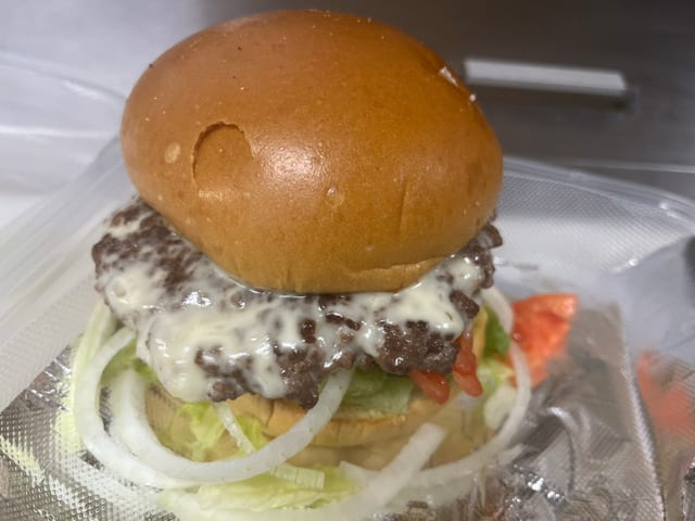 Buy One Cheeseburger, Get the Second 50% Off!.