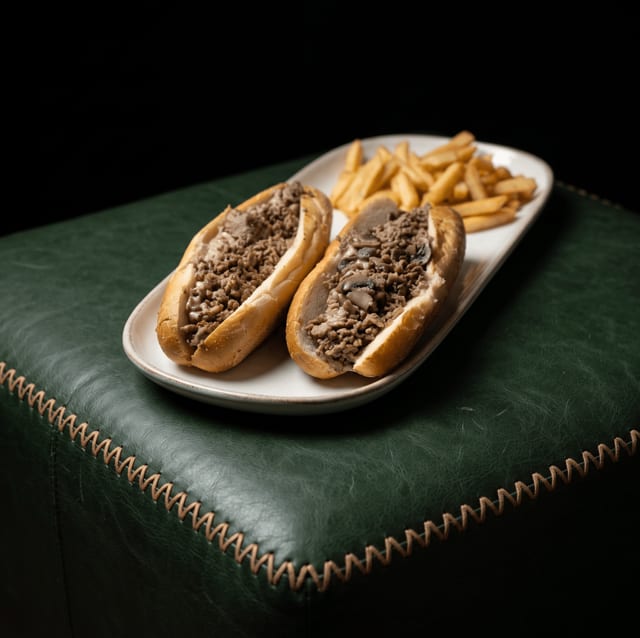 2 Cheesesteaks or Subs and 1 Large Fry.